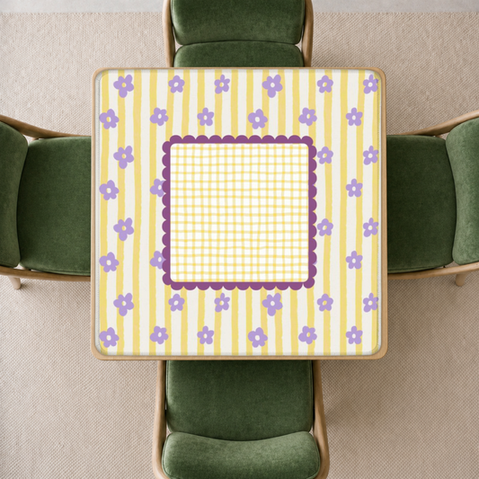 mahjong mat a yellow and white striped border, purple floral accents, and a central gingham patterned section