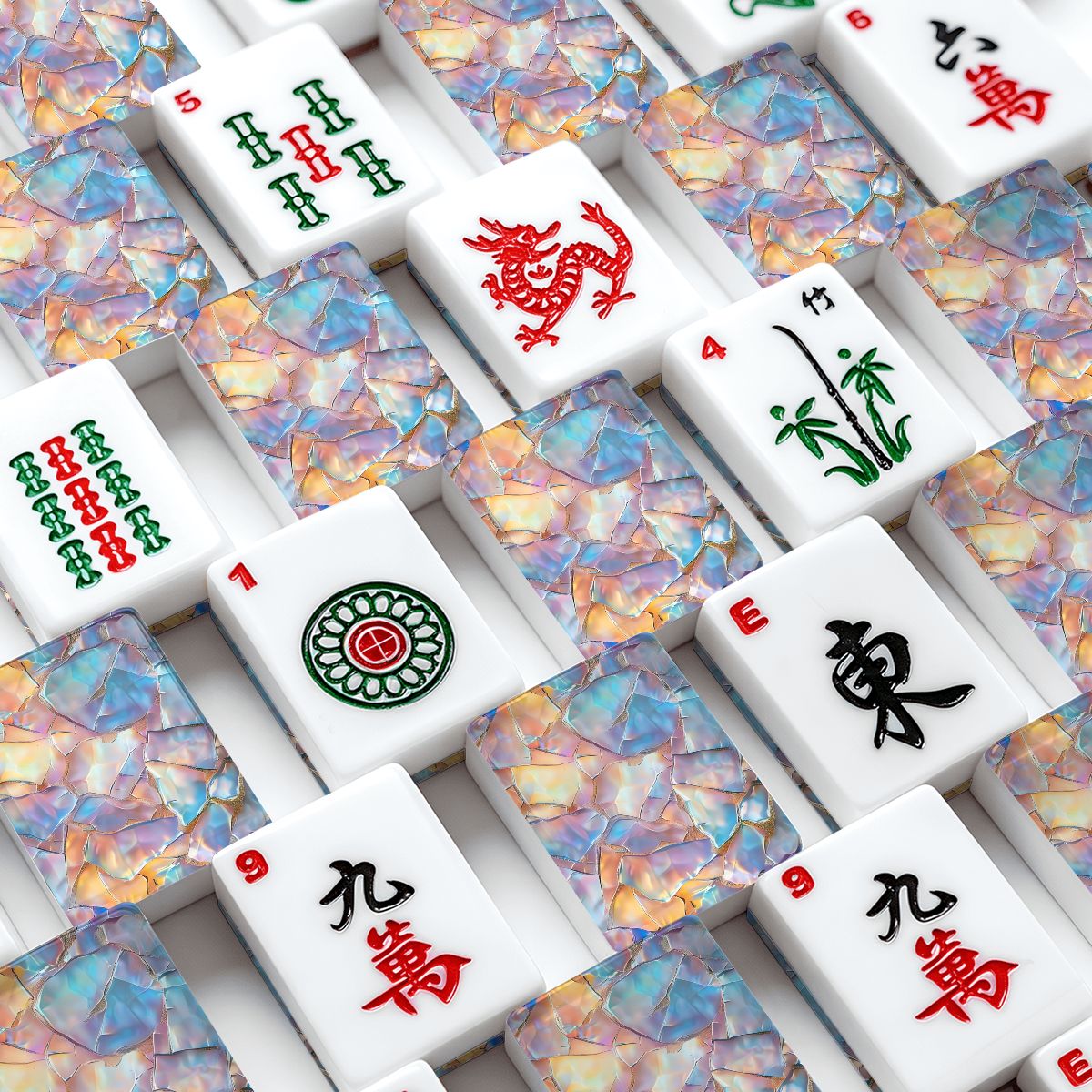 A close-up overhead view of Mahjong tiles arranged in a grid with mother of pearl design on the back