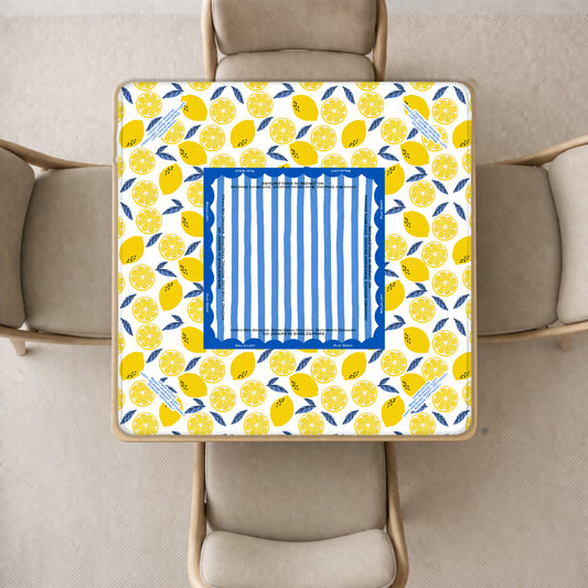 mahjong mat featuring a yellow lemon pattern, and a central blue-and-white striped panel, shown from above