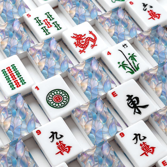 White Mahjong tiles with mop design with iridescent blue and purple reflections.