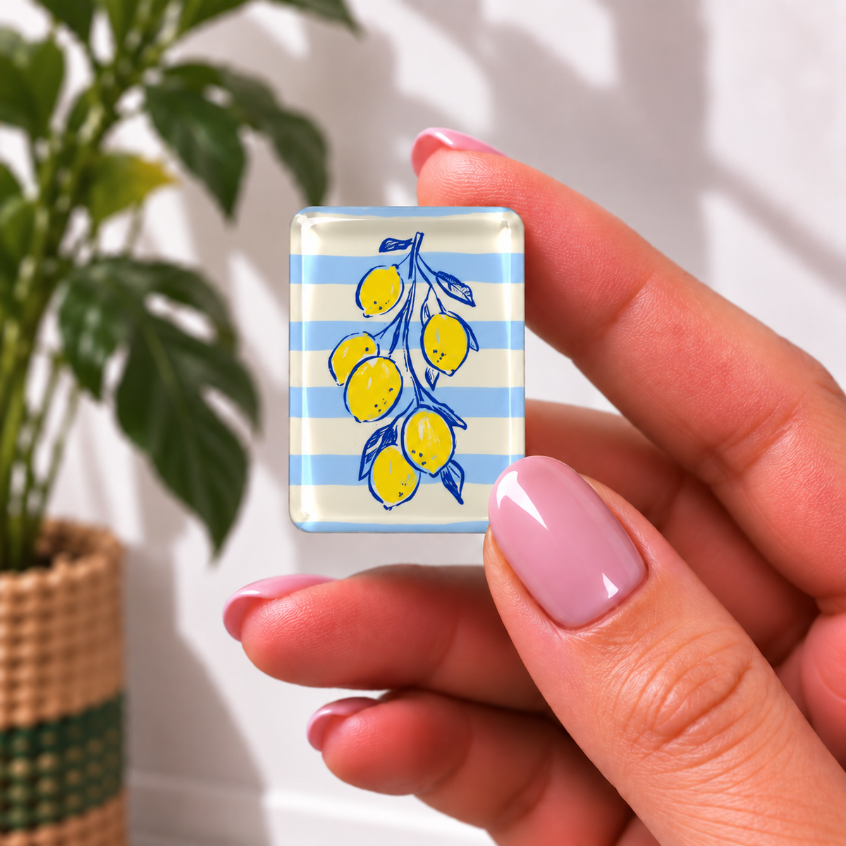 mahjong tile featuring a blue and white striped background with yellow lemons on a branch