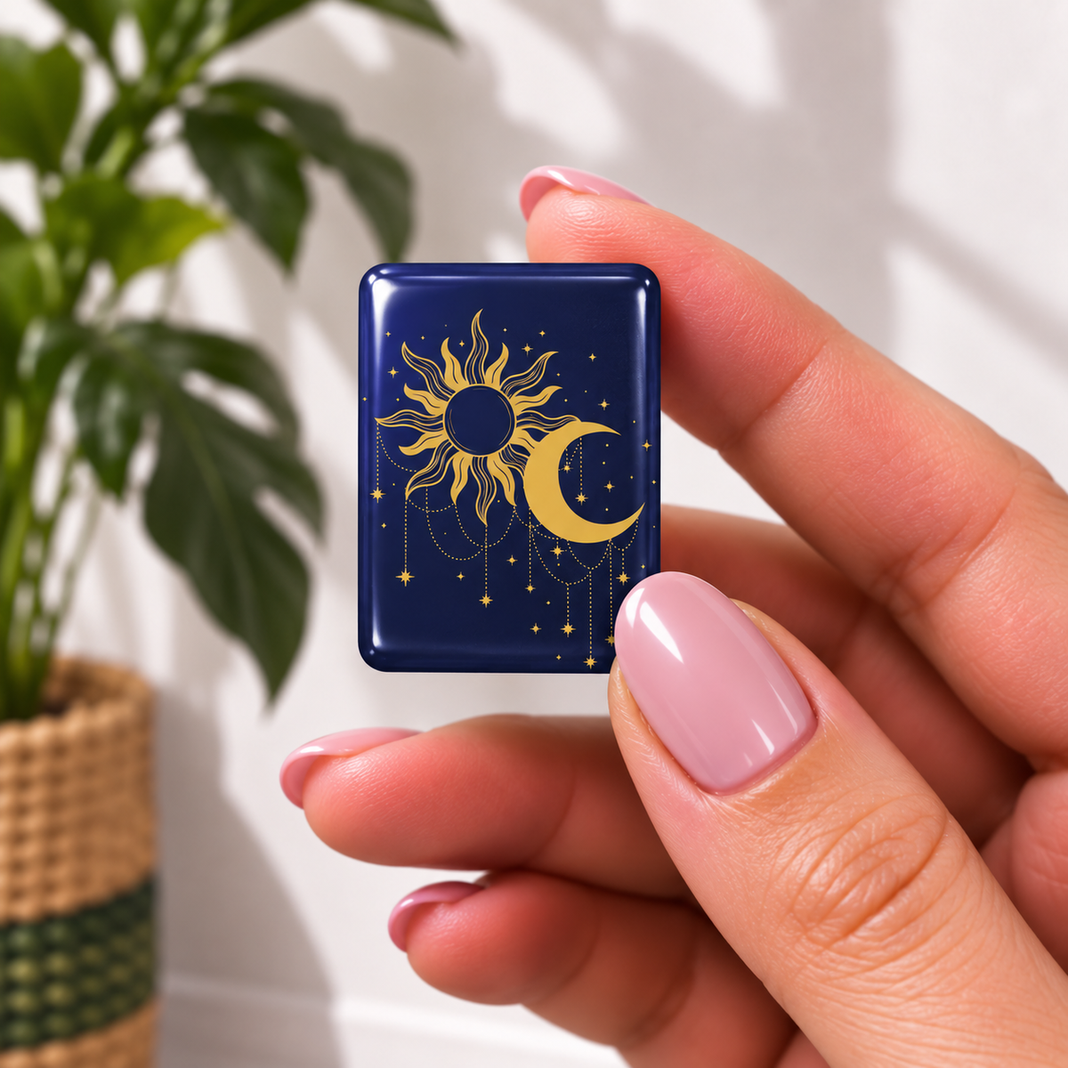 mahjong tilefeaturing a gold sun and crescent moon design